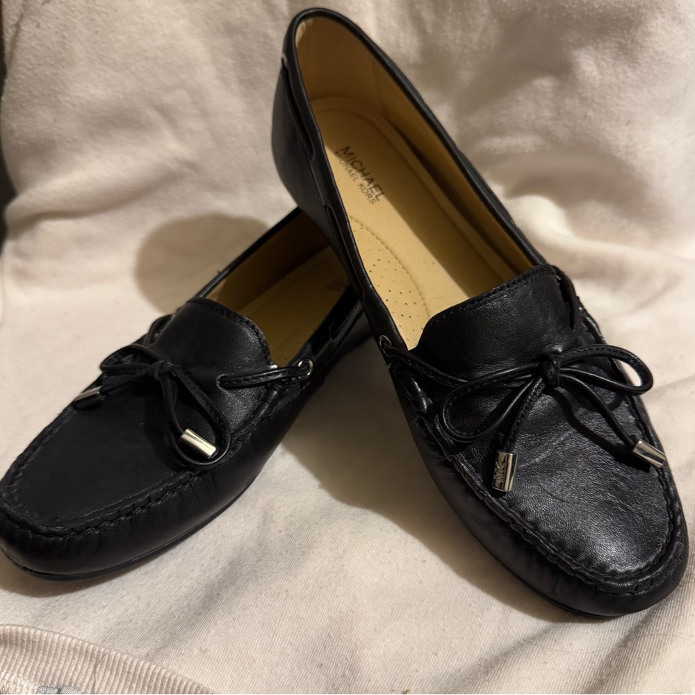 Like new Michael Michael Kors black loafers w/ metal accents on heels sz 7.5